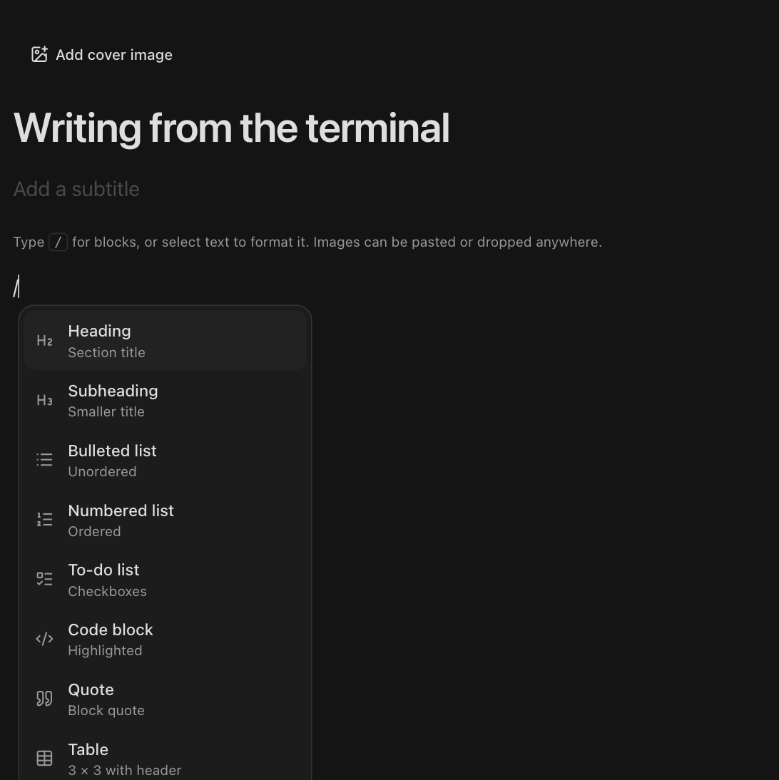 The slash menu open in the editor